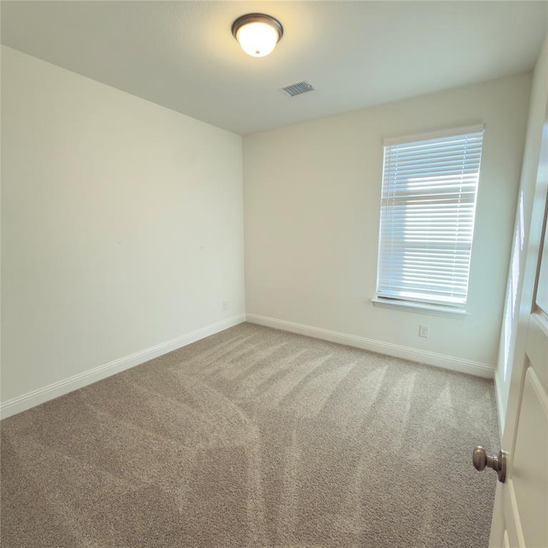 2541 Brunswick Way Allen, TX 75013 - Photo 18 of 20 an empty room with a window