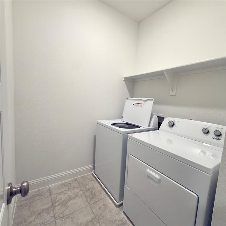 2541 Brunswick Way Allen, TX 75013 - Photo 10 of 20 a utility room with dryer and washer