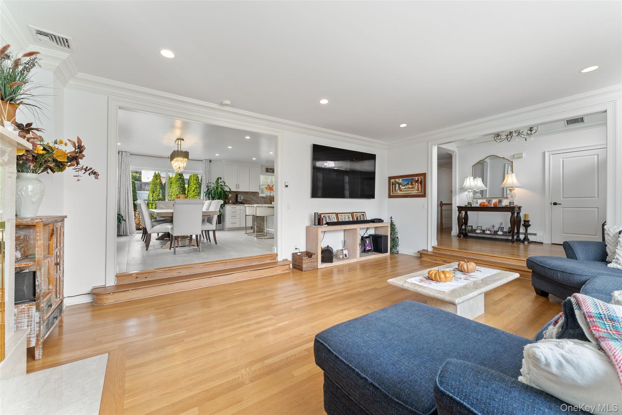 6 Hunting Ridge Road White Plains, NY 10605 - Photo 6 of 32 a living room with furniture and a flat screen tv