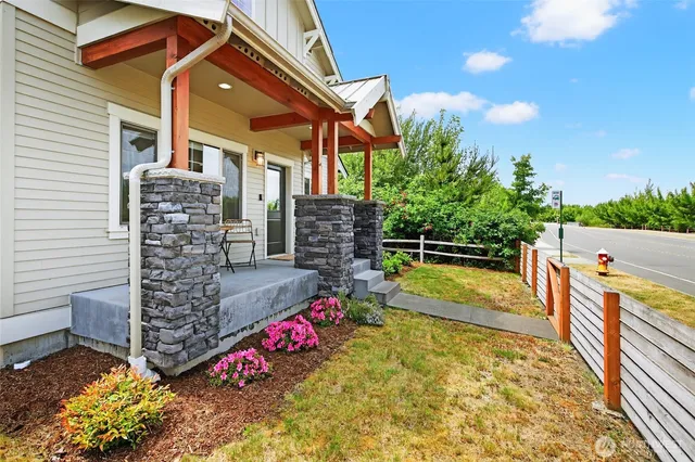 a view of swimming pool with sitting area