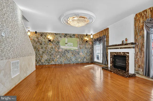 a view of a hallway with a chandelier