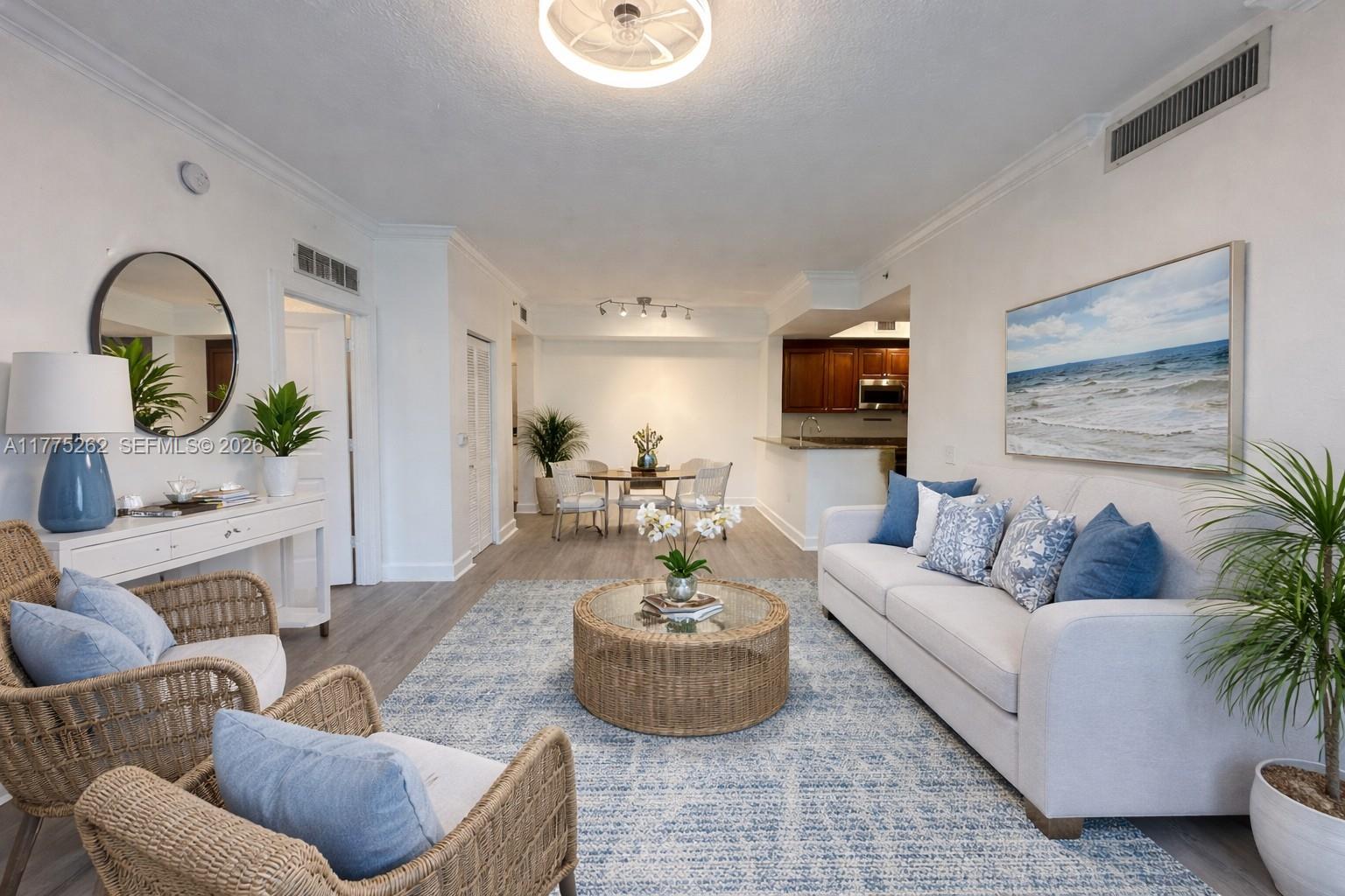 a living room with furniture and a mirror