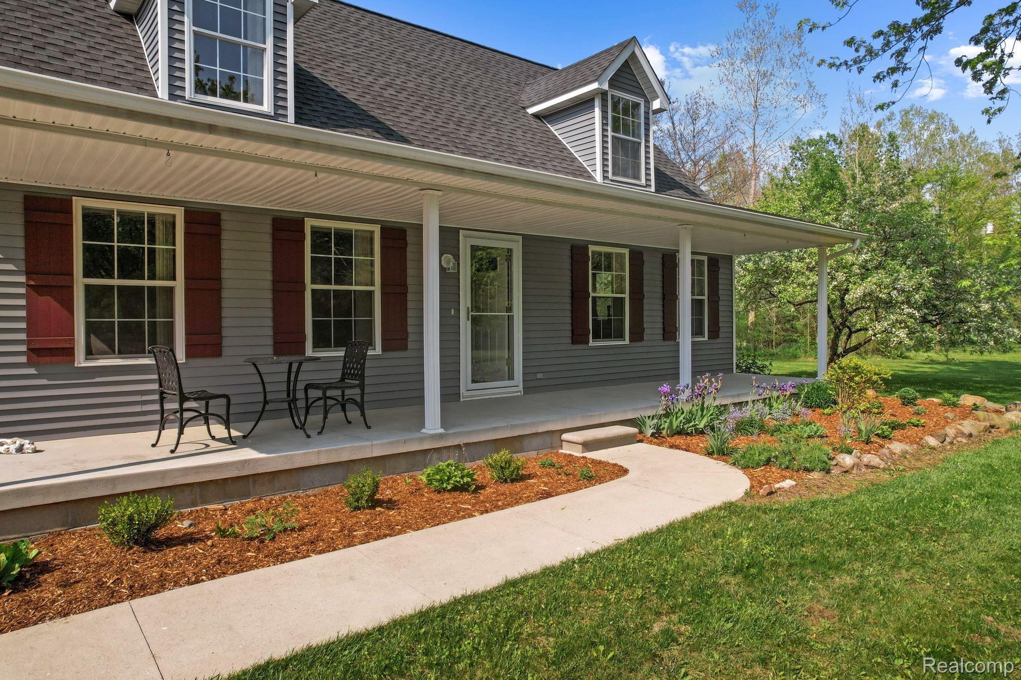8312 Lambs Road Goodells, MI 48027 - Photo 7 of 46 Spacious covered front porch