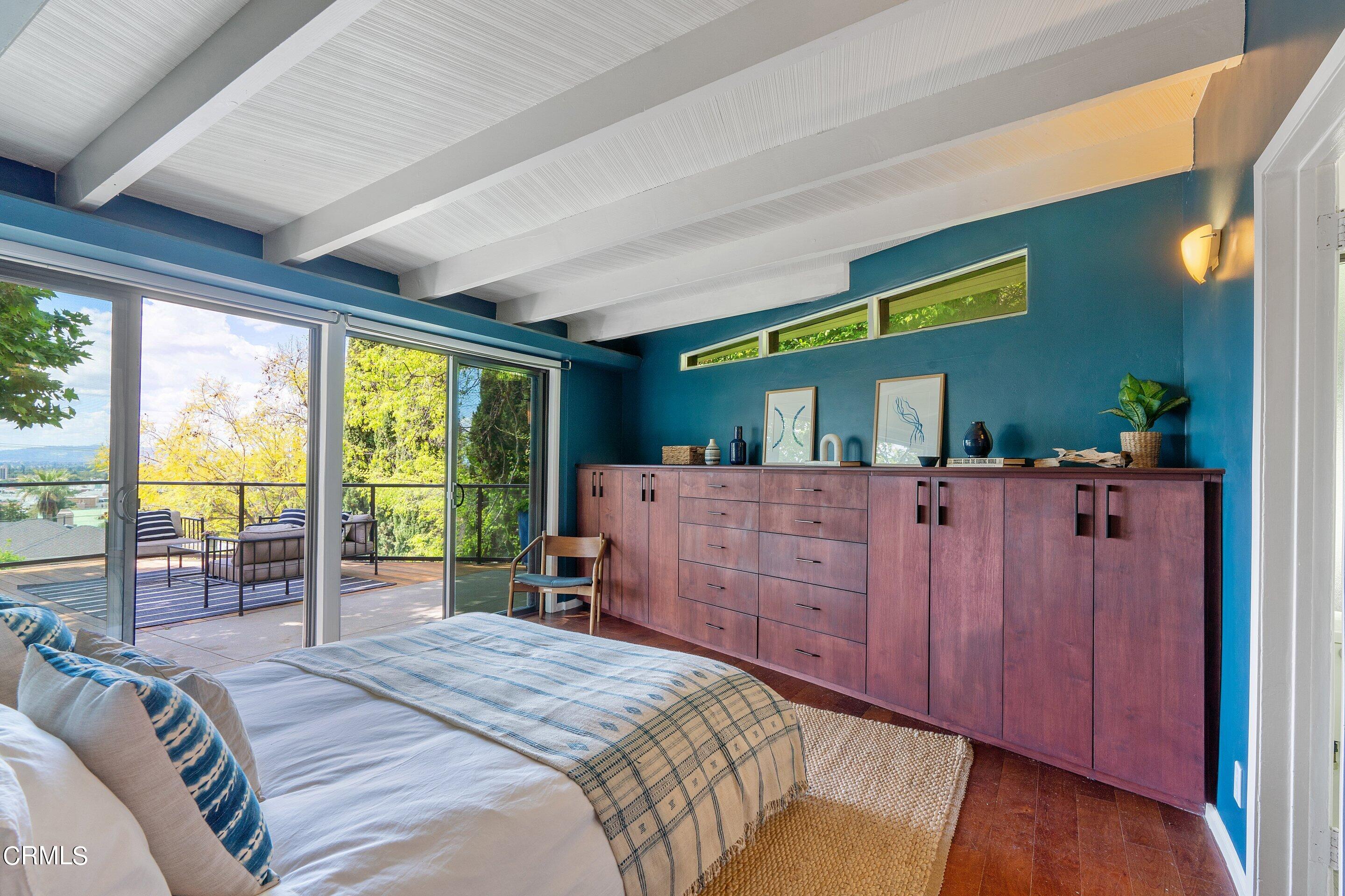 917 Crescent Drive Monrovia, CA 91016 - Photo 13 of 28 a bed room with a bed and a large window