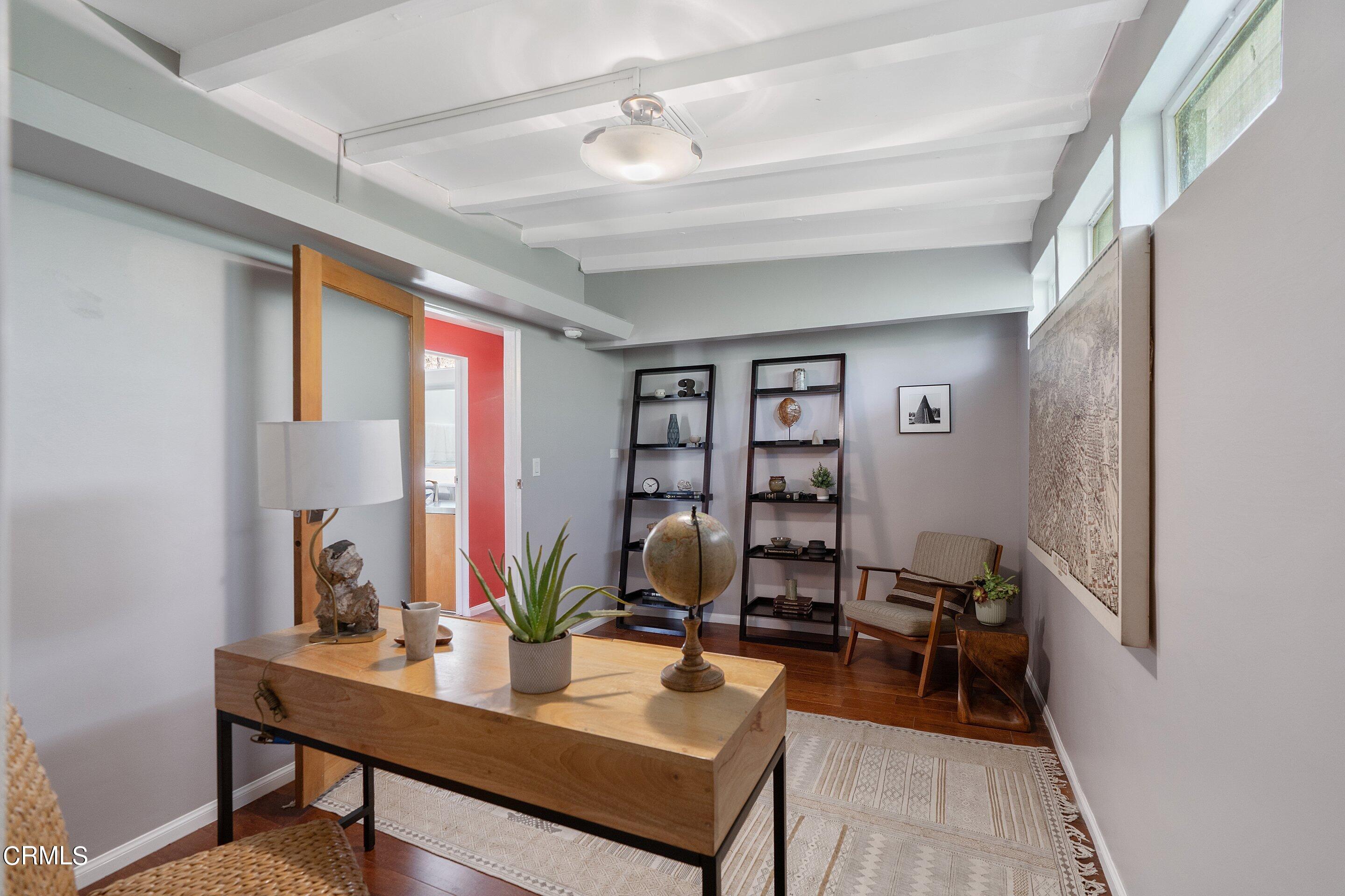 917 Crescent Drive Monrovia, CA 91016 - Photo 19 of 28 a workspace with furniture and wooden floor