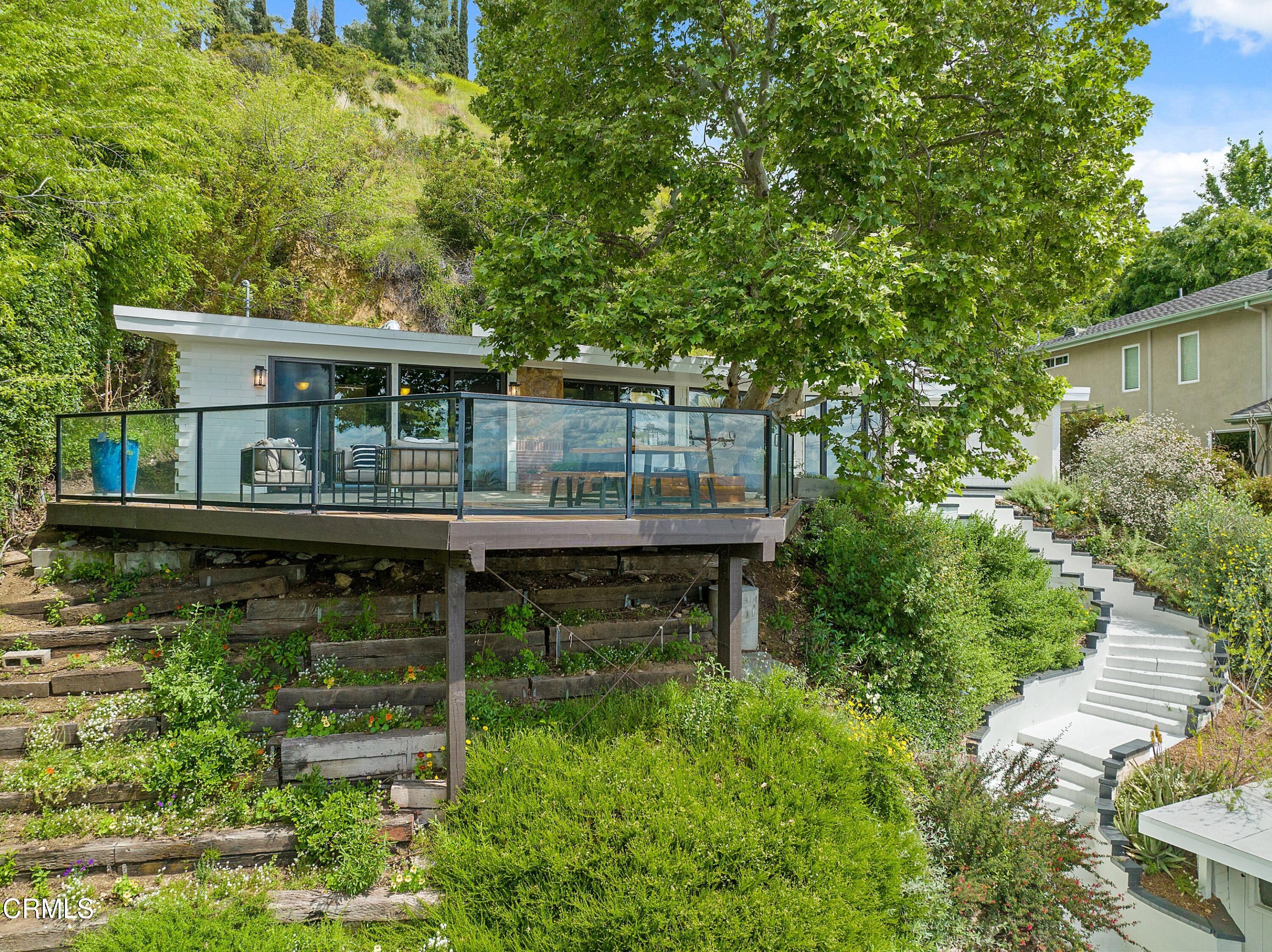 917 Crescent Drive Monrovia, CA 91016 - Photo 2 of 28 front view of a house with a balcony