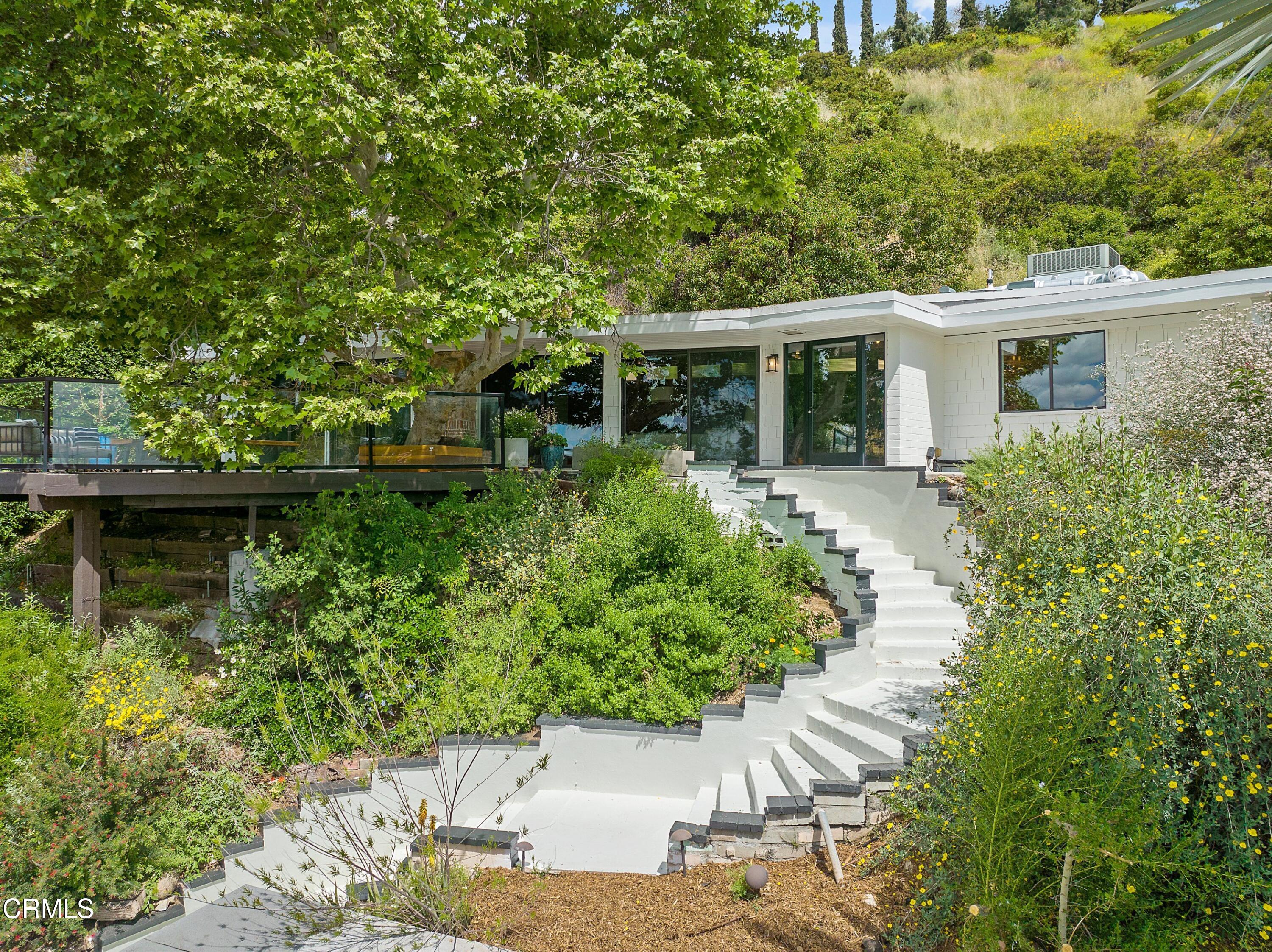 917 Crescent Drive Monrovia, CA 91016 - Photo 25 of 28 a front view of a house with a yard