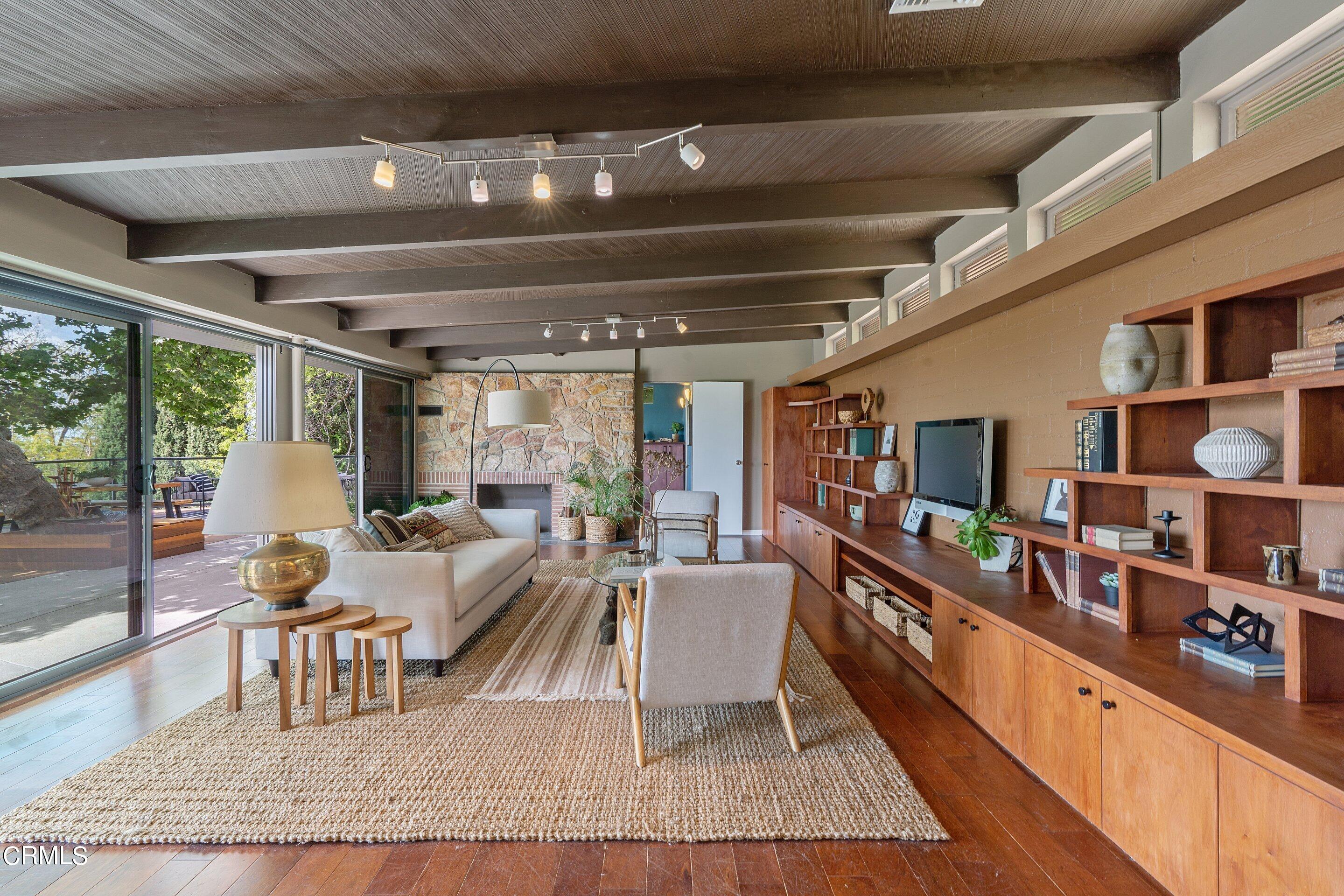917 Crescent Drive Monrovia, CA 91016 - Photo 6 of 28 a living room with lots of furniture and a rug