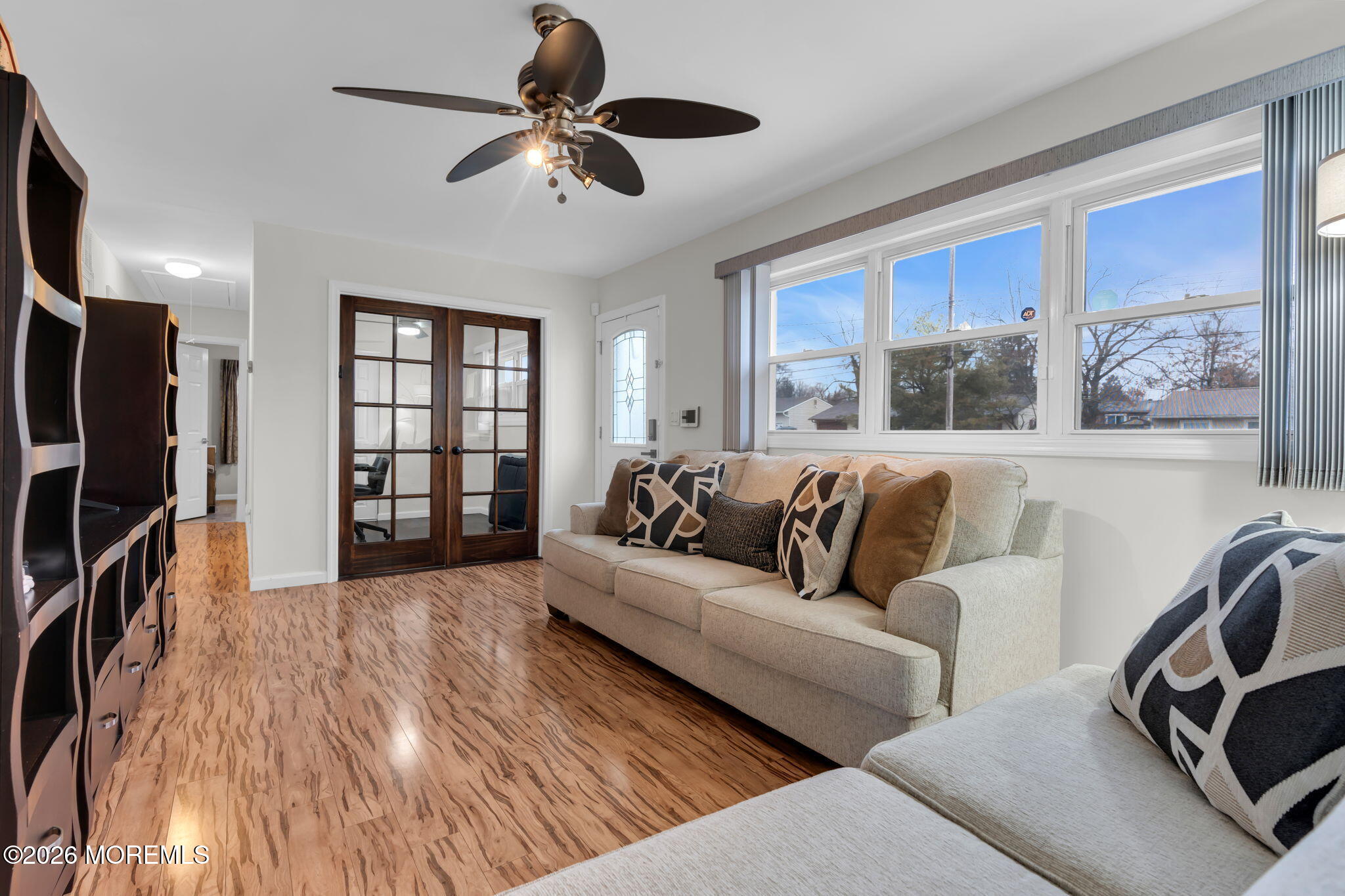 31 Colgate Drive Toms River, NJ 08757 - Photo 11 of 34 a living room with furniture and a flat screen tv