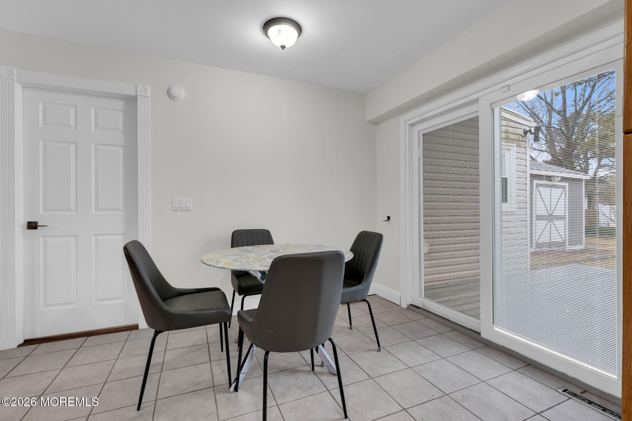 31 Colgate Drive Toms River, NJ 08757 - Photo 16 of 34 a view of a dining room with furniture and a window
