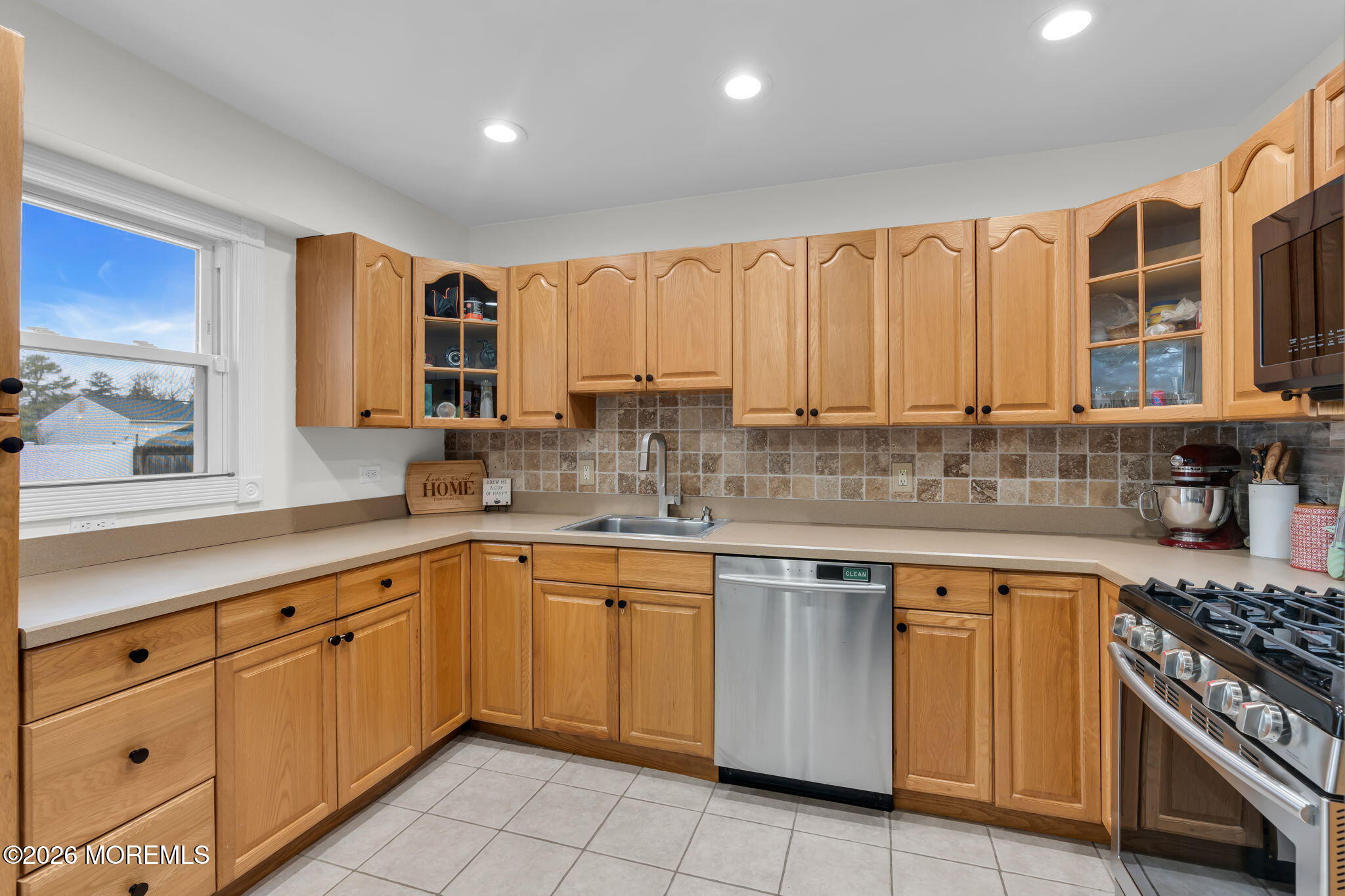 31 Colgate Drive Toms River, NJ 08757 - Photo 18 of 34 a kitchen with a sink stove and cabinets