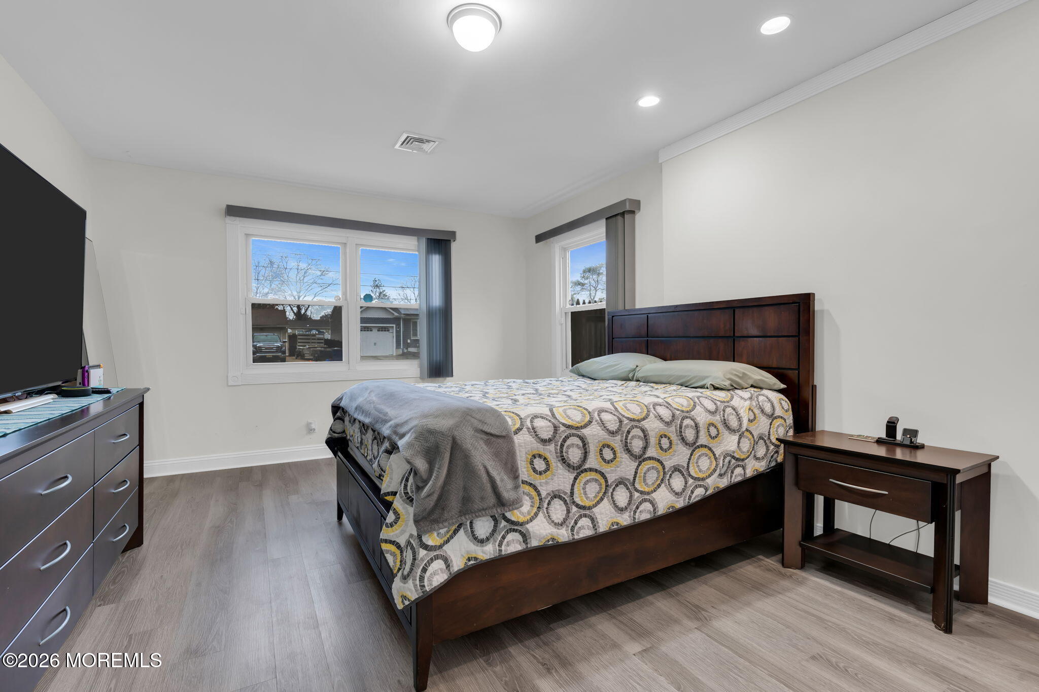 31 Colgate Drive Toms River, NJ 08757 - Photo 21 of 34 a bedroom with a bed and a flat screen tv