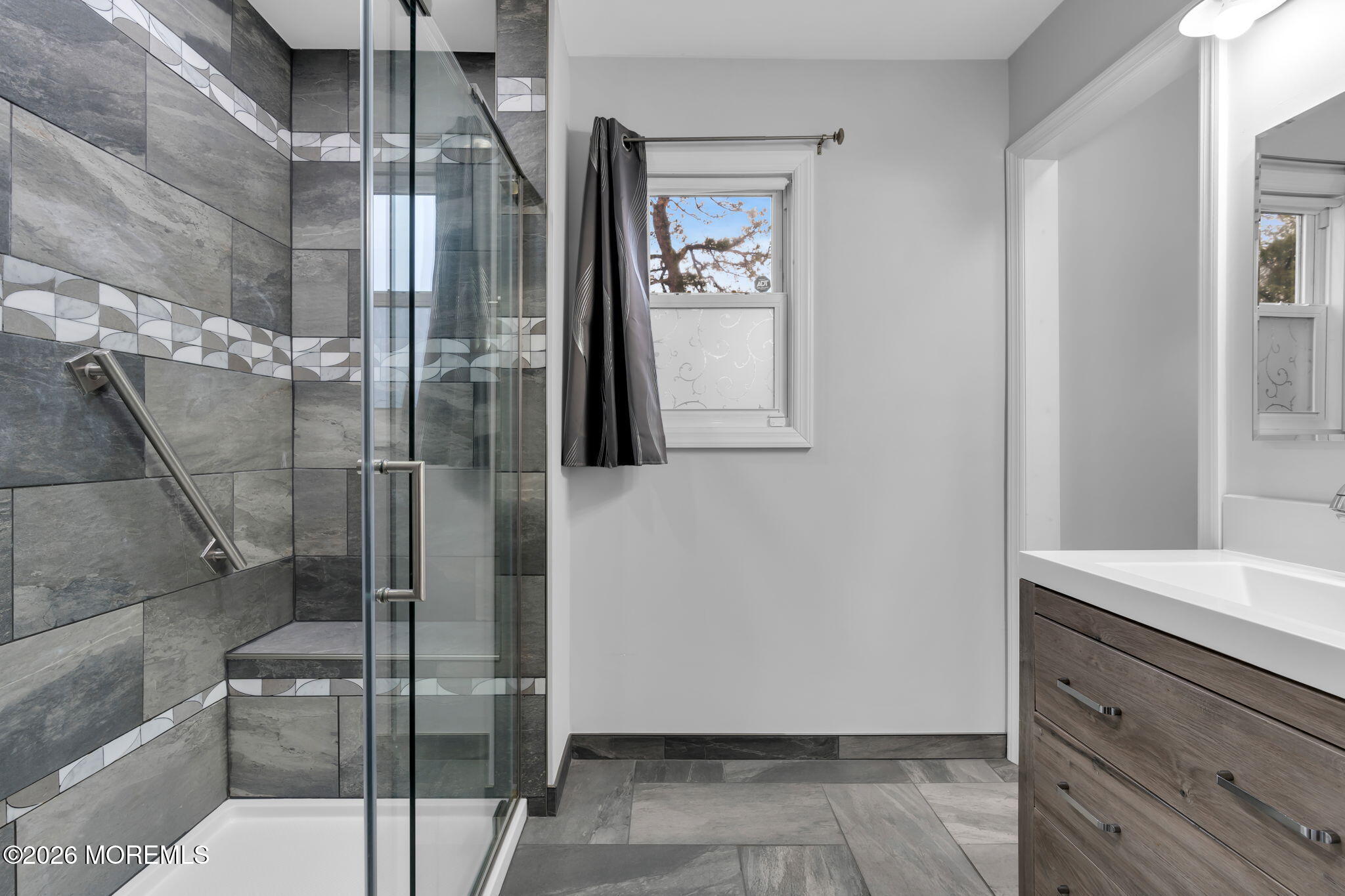 31 Colgate Drive Toms River, NJ 08757 - Photo 23 of 34 a bathroom with a shower