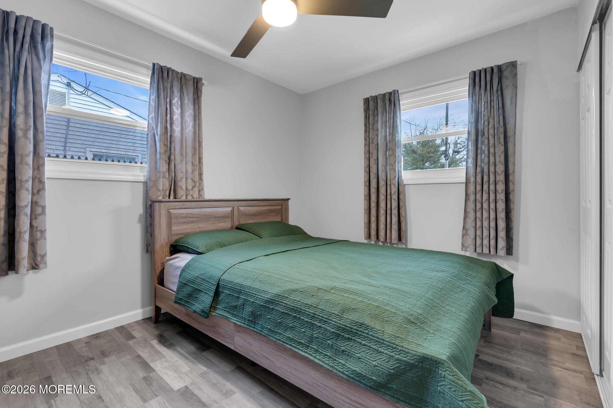 31 Colgate Drive Toms River, NJ 08757 - Photo 25 of 34 a bedroom with a bed and window