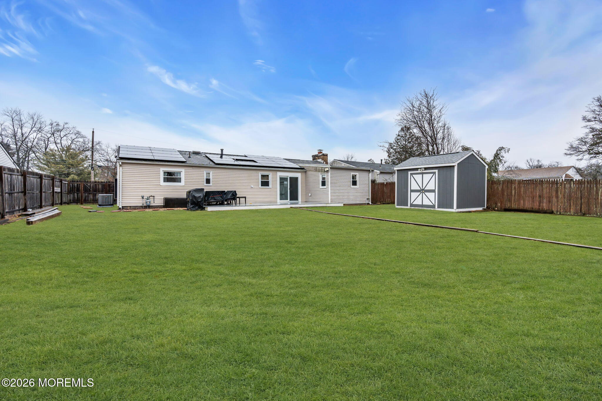 31 Colgate Drive Toms River, NJ 08757 - Photo 32 of 34 a view of a house with a big yard