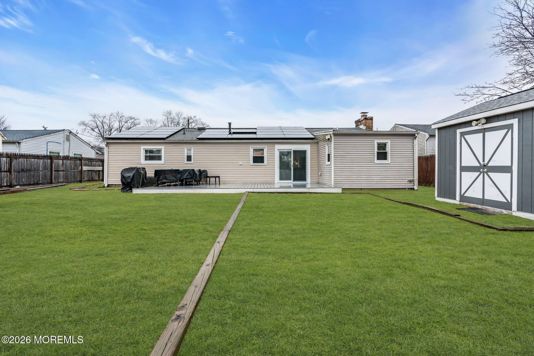 31 Colgate Drive Toms River, NJ 08757 - Photo 33 of 34 a view of a house with a big yard and large trees