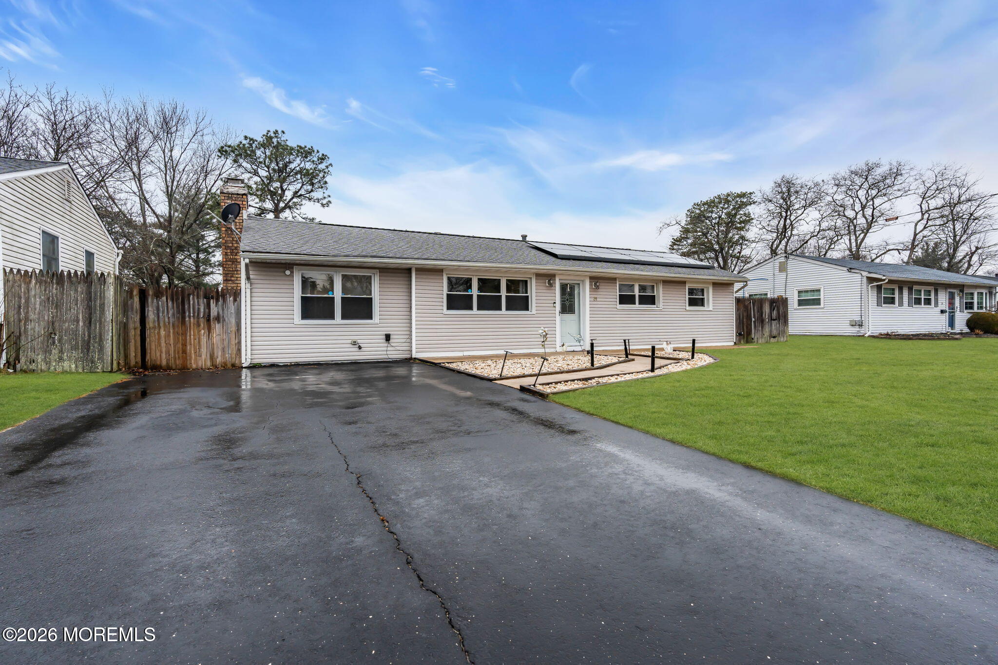 31 Colgate Drive Toms River, NJ 08757 - Photo 6 of 34 a view of house with a big yard and large trees