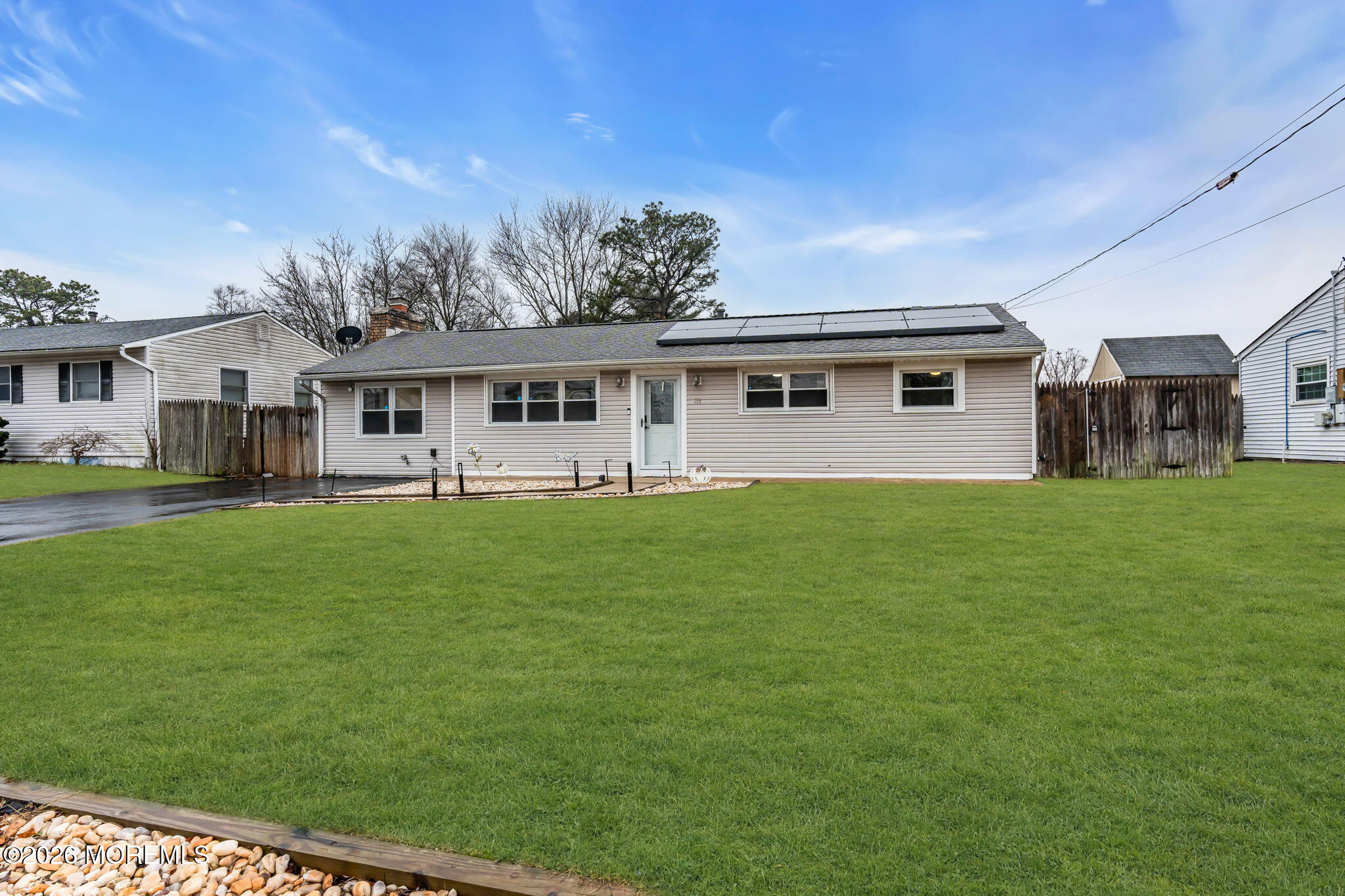 31 Colgate Drive Toms River, NJ 08757 - Photo 7 of 34 a front view of house with yard and green space