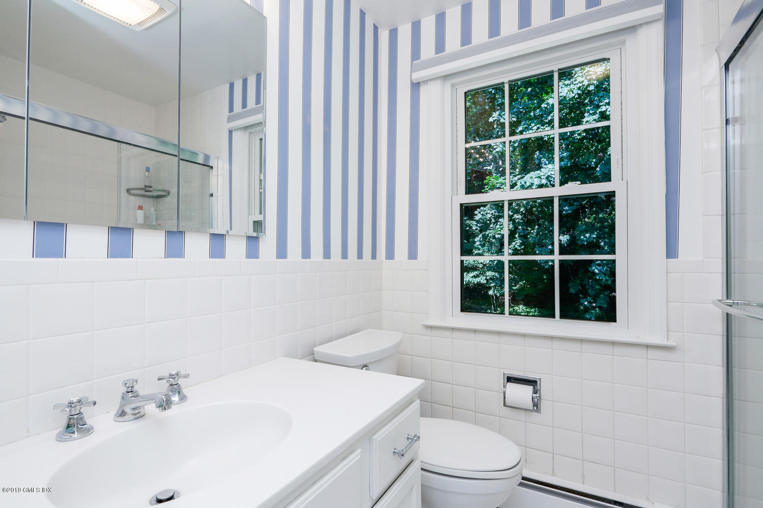 28 Revere Road Riverside, CT 06878 - Photo 11 of 29 a bathroom with a sink a toilet and shower