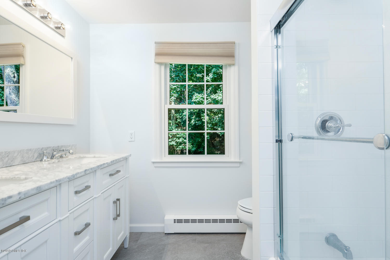 28 Revere Road Riverside, CT 06878 - Photo 13 of 29 a bathroom with a granite countertop sink toilet and mirror