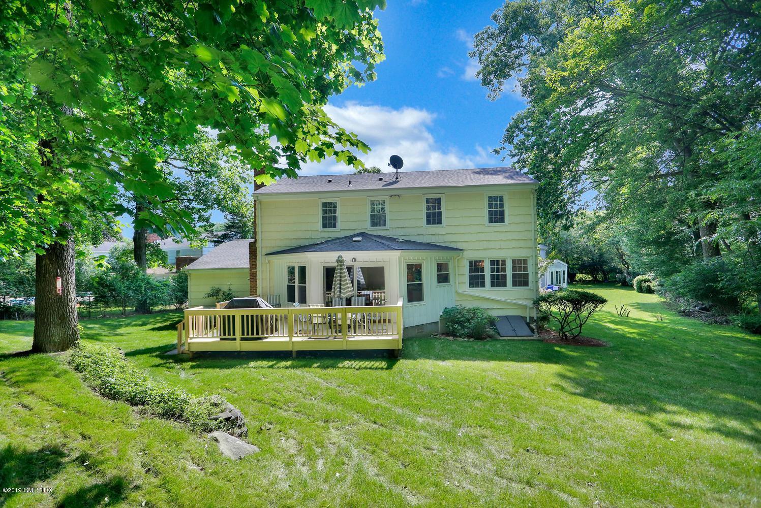 28 Revere Road Riverside, CT 06878 - Photo 28 of 29 a view of house with a yard