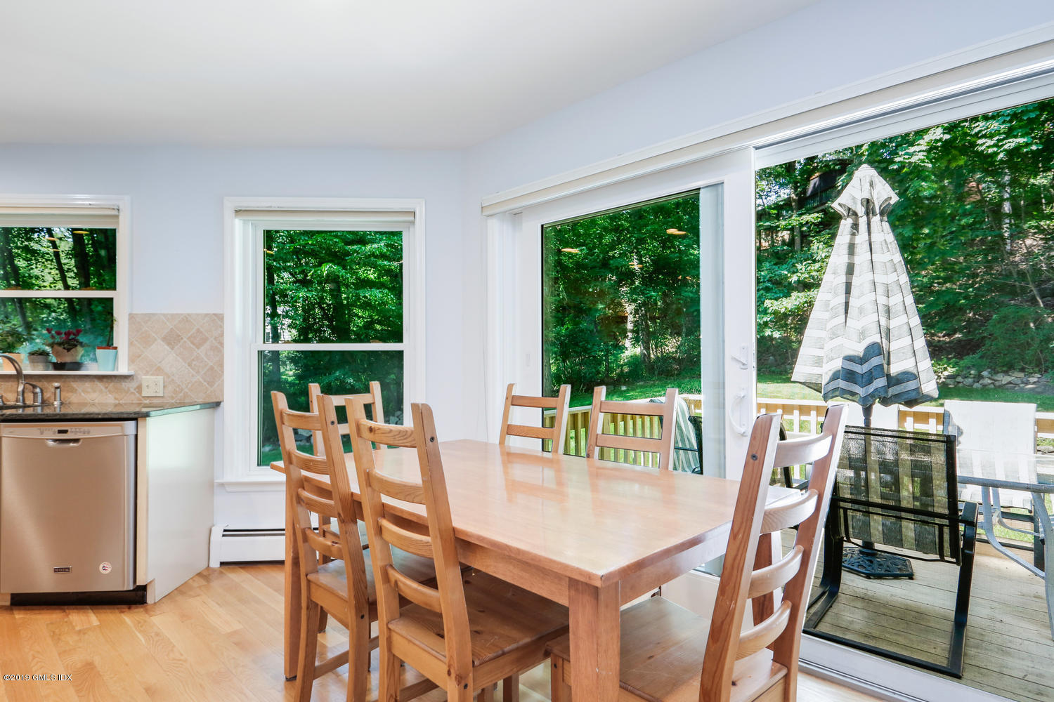 28 Revere Road Riverside, CT 06878 - Photo 6 of 29 a view of a dining room with furniture window and outside view