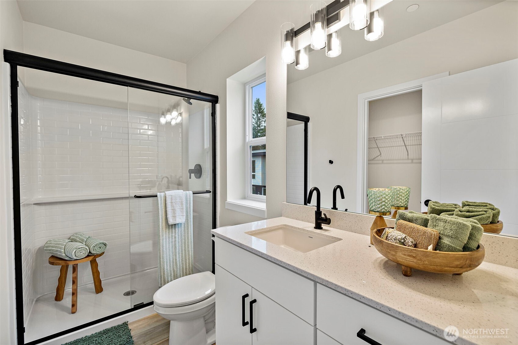 5015 144th Street Southwest, Unit B3 Edmonds, WA 98026 - Photo 27 of 39 a bathroom with a toilet a sink and mirror