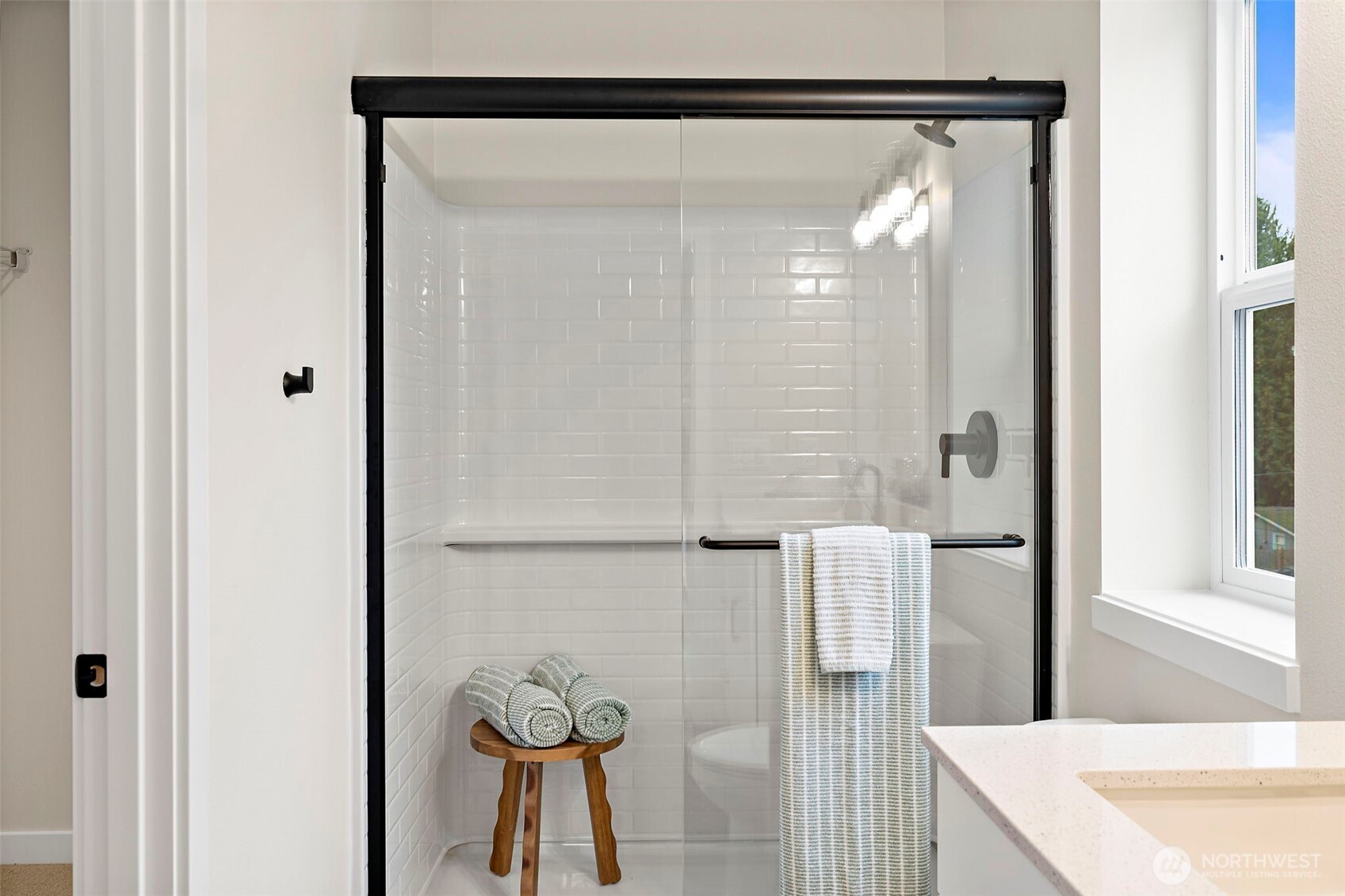 5015 144th Street Southwest, Unit B3 Edmonds, WA 98026 - Photo 28 of 39 a bathroom with a shower and a sink