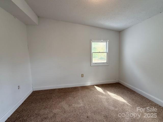 104 Price Street Mount Holly, NC 28120 - Photo 26 of 37 an empty room with a window