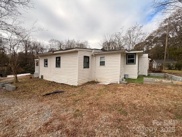 104 Price Street Mount Holly, NC 28120 - Photo 35 of 37 a view of a house with a yard