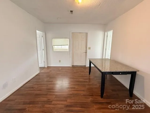 a view of livingroom with furniture and wooden floor