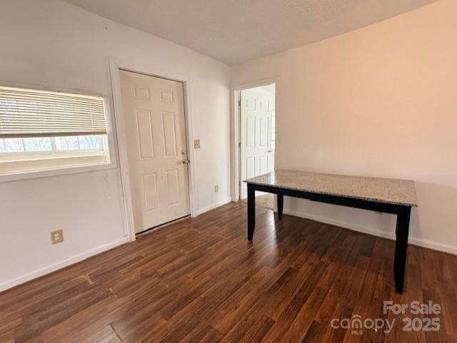 104 Price Street Mount Holly, NC 28120 - Photo 5 of 37 a view of an empty room with wooden floor and a window
