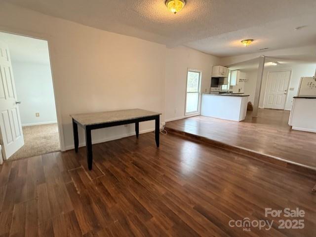 104 Price Street Mount Holly, NC 28120 - Photo 6 of 37 a view of kitchen with cabinets and wooden floor