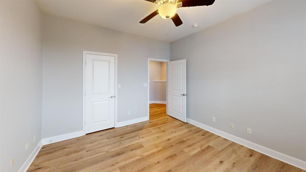 4904 Live Oak Street, Unit 1 Dallas, TX 75206 - Photo 12 of 20 a view of empty room with wooden floor