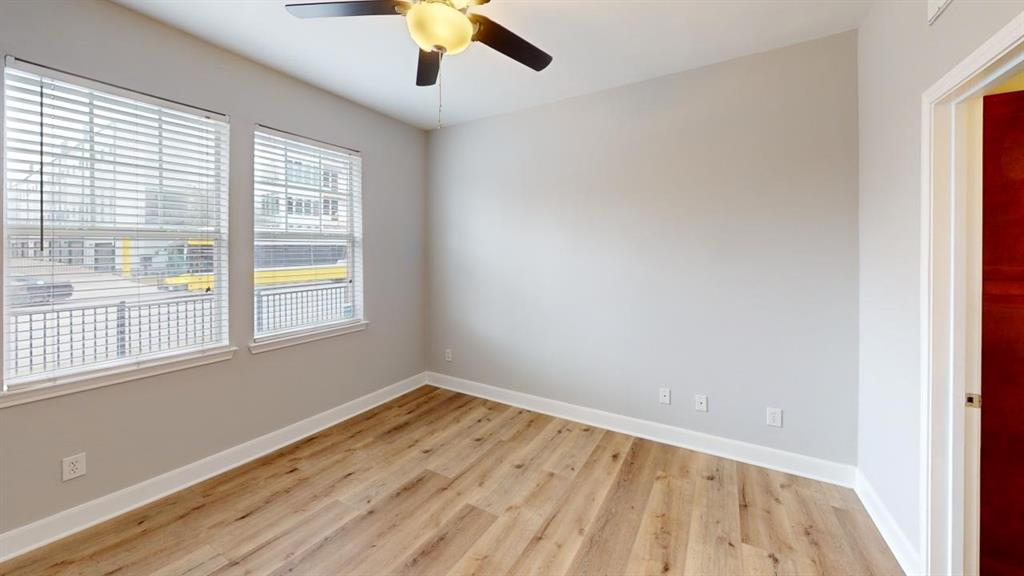 4904 Live Oak Street, Unit 1 Dallas, TX 75206 - Photo 8 of 20 an empty room with a window