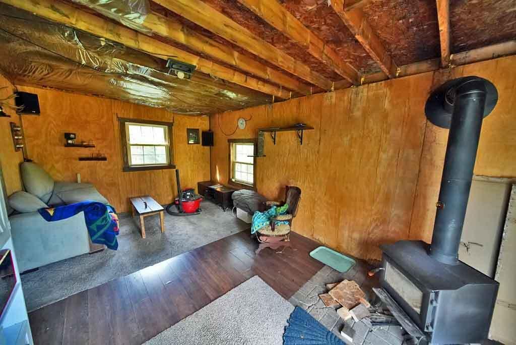 1312 U.S. Rte 1 Amity, ME 04471 - Photo 12 of 48 living-room-off-grid-home