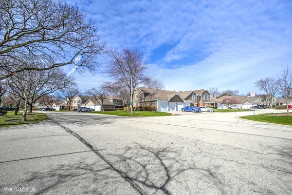 a view of a street with houses