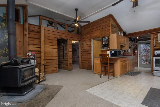 a kitchen with stainless steel appliances a stove and a refrigerator