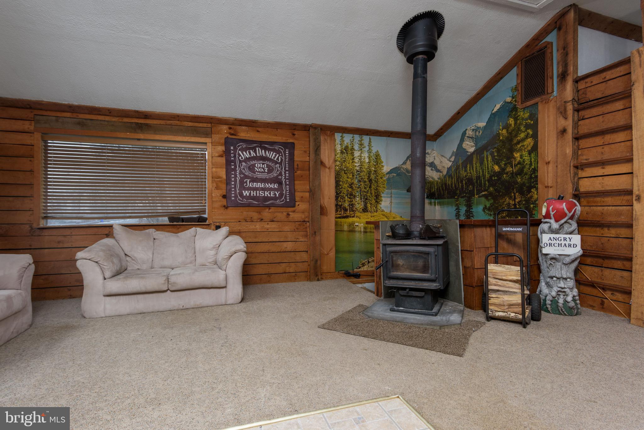 1016 Blue Ridge Road Harrisburg, PA 17110 - Photo 16 of 30 a living room with furniture and a flat screen tv