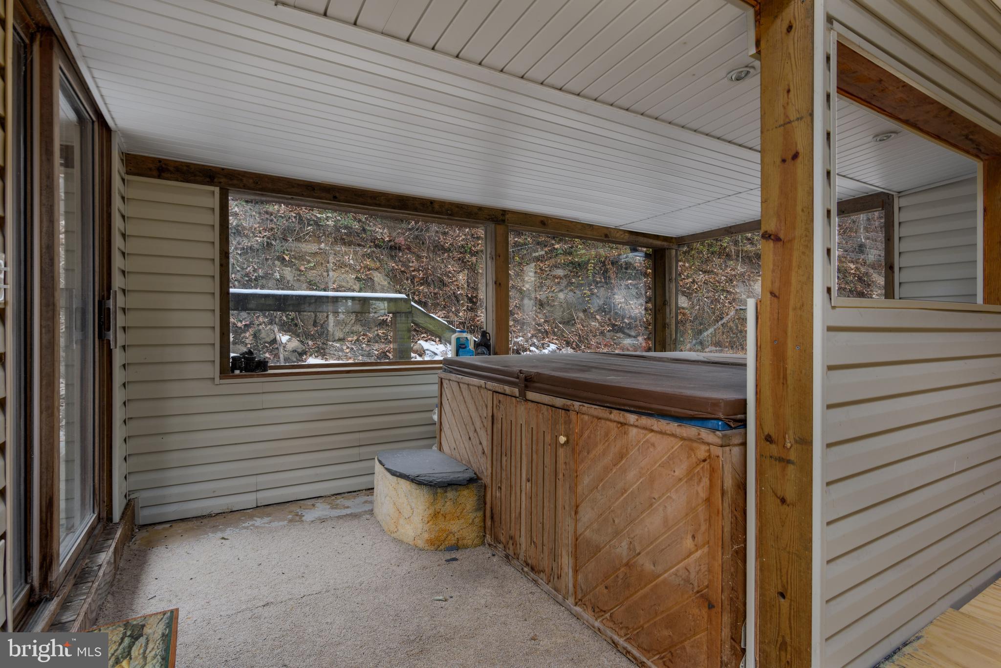 1016 Blue Ridge Road Harrisburg, PA 17110 - Photo 26 of 30 a view of a patio with table and chairs and wooden floor