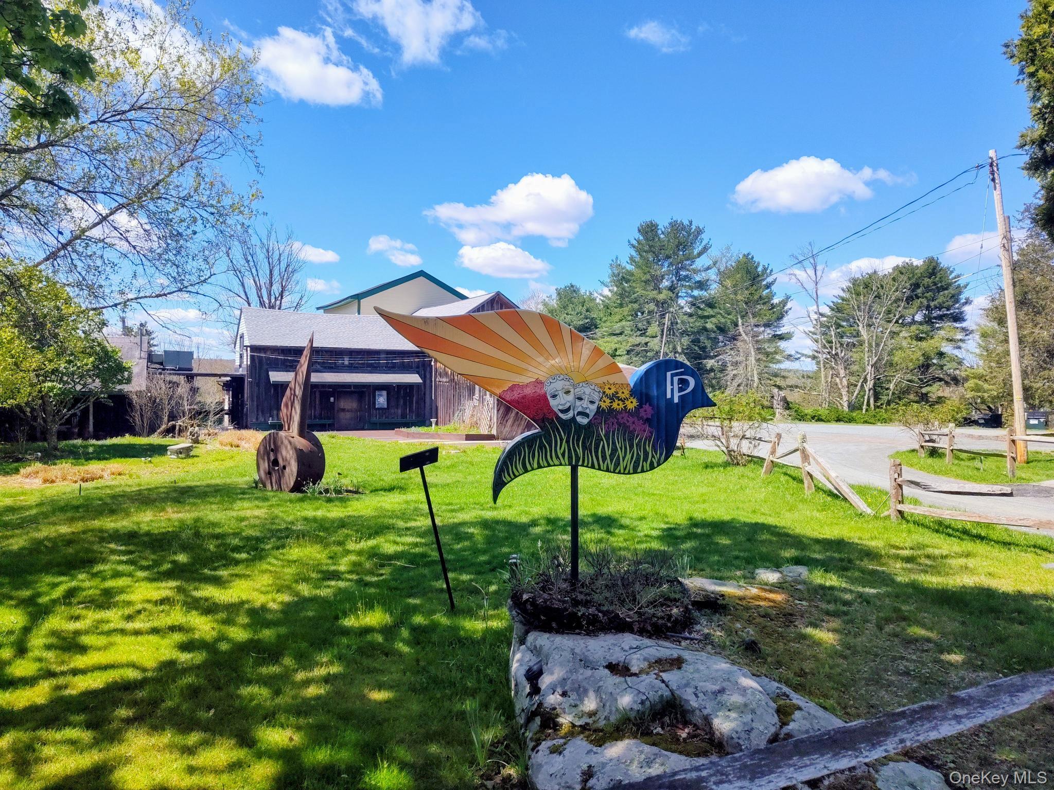 983 Plank Road Forestburgh, NY 12777 - Photo 48 of 50 a view of a yard with plants and a fountain