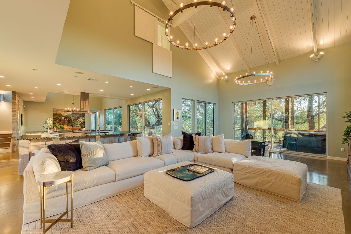 23601 Old Ferry Road, Unit 20 Spicewood, TX 78669 - Photo 11 of 40 Large living area with high ceilings and expansive windows to enjoy the amazing views