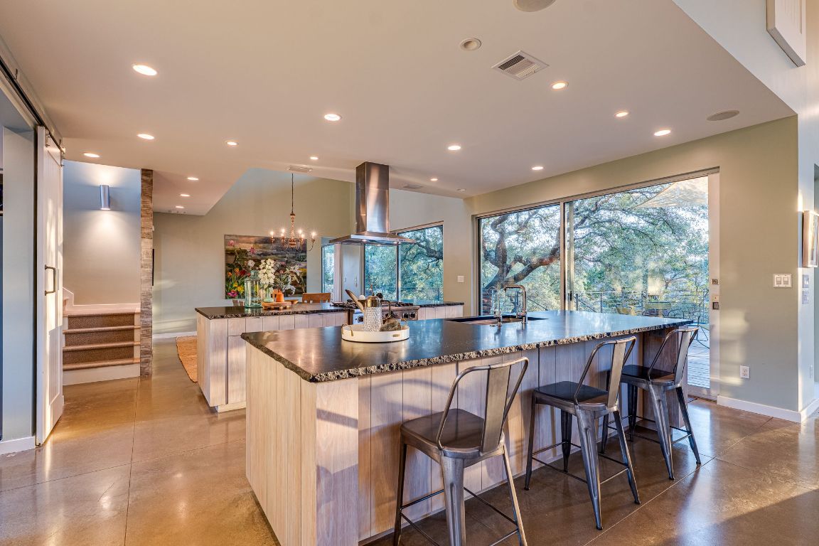 23601 Old Ferry Road, Unit 20 Spicewood, TX 78669 - Photo 15 of 40 Breakfast bar with seating