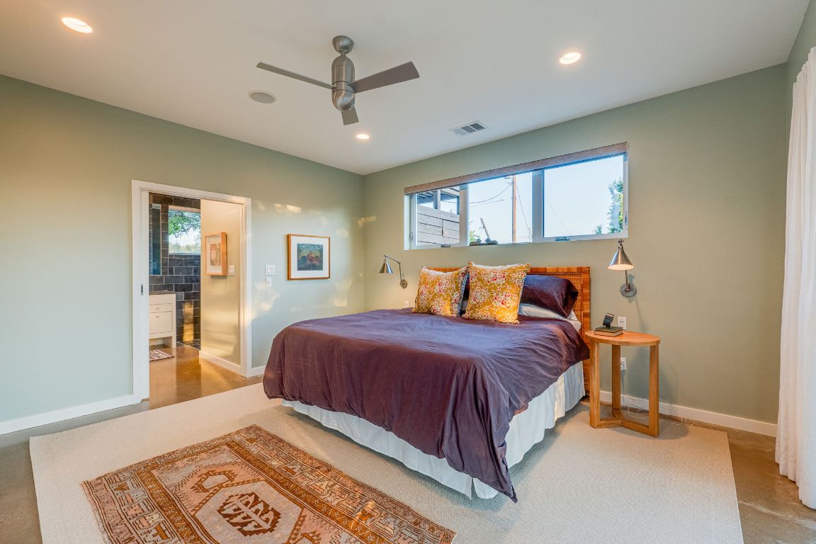 23601 Old Ferry Road, Unit 20 Spicewood, TX 78669 - Photo 22 of 40 Primary bedroom suite