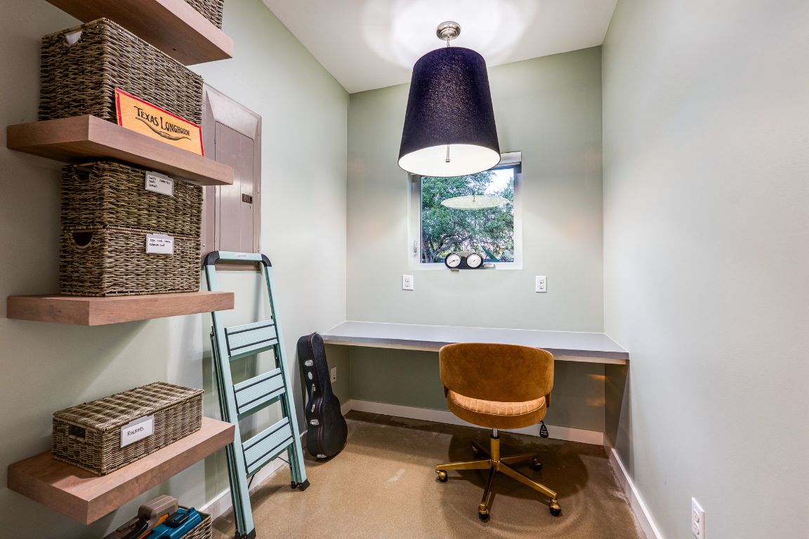 23601 Old Ferry Road, Unit 20 Spicewood, TX 78669 - Photo 24 of 40 a workspace with furniture and a window