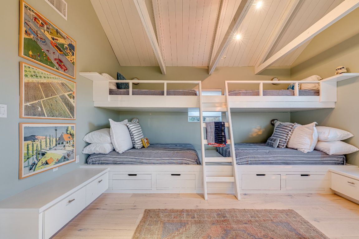 23601 Old Ferry Road, Unit 20 Spicewood, TX 78669 - Photo 25 of 40 a view of living room with furniture and flat screen tv
