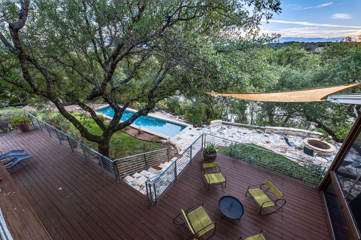 23601 Old Ferry Road, Unit 20 Spicewood, TX 78669 - Photo 4 of 40 a view of deck with furniture and trees