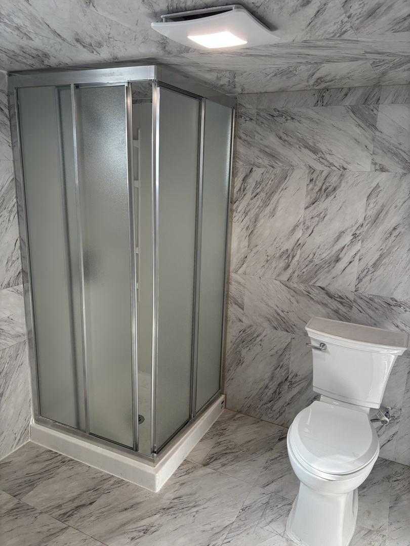 1107 Campbell Avenue Wheaton, IL 60189 - Photo 20 of 20 a bathroom with a toilet and a shower