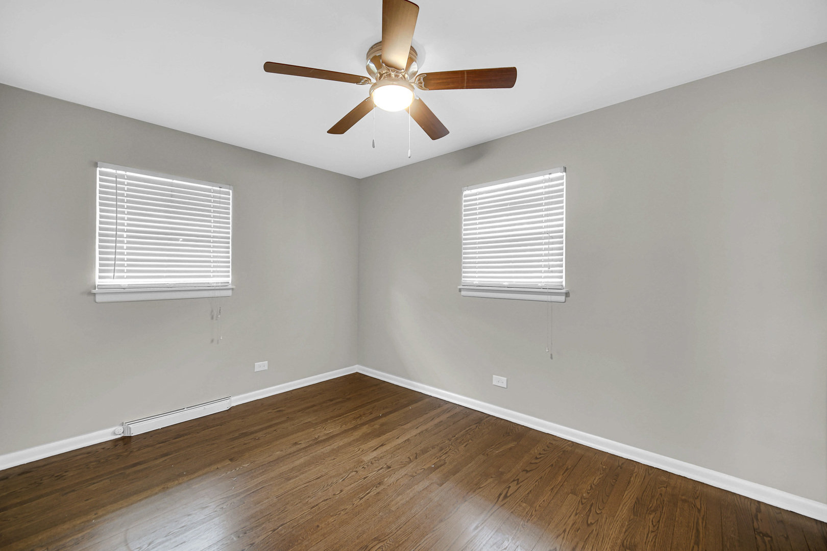 1107 Campbell Avenue Wheaton, IL 60189 - Photo 8 of 20 a view of a room with wooden floor and windows