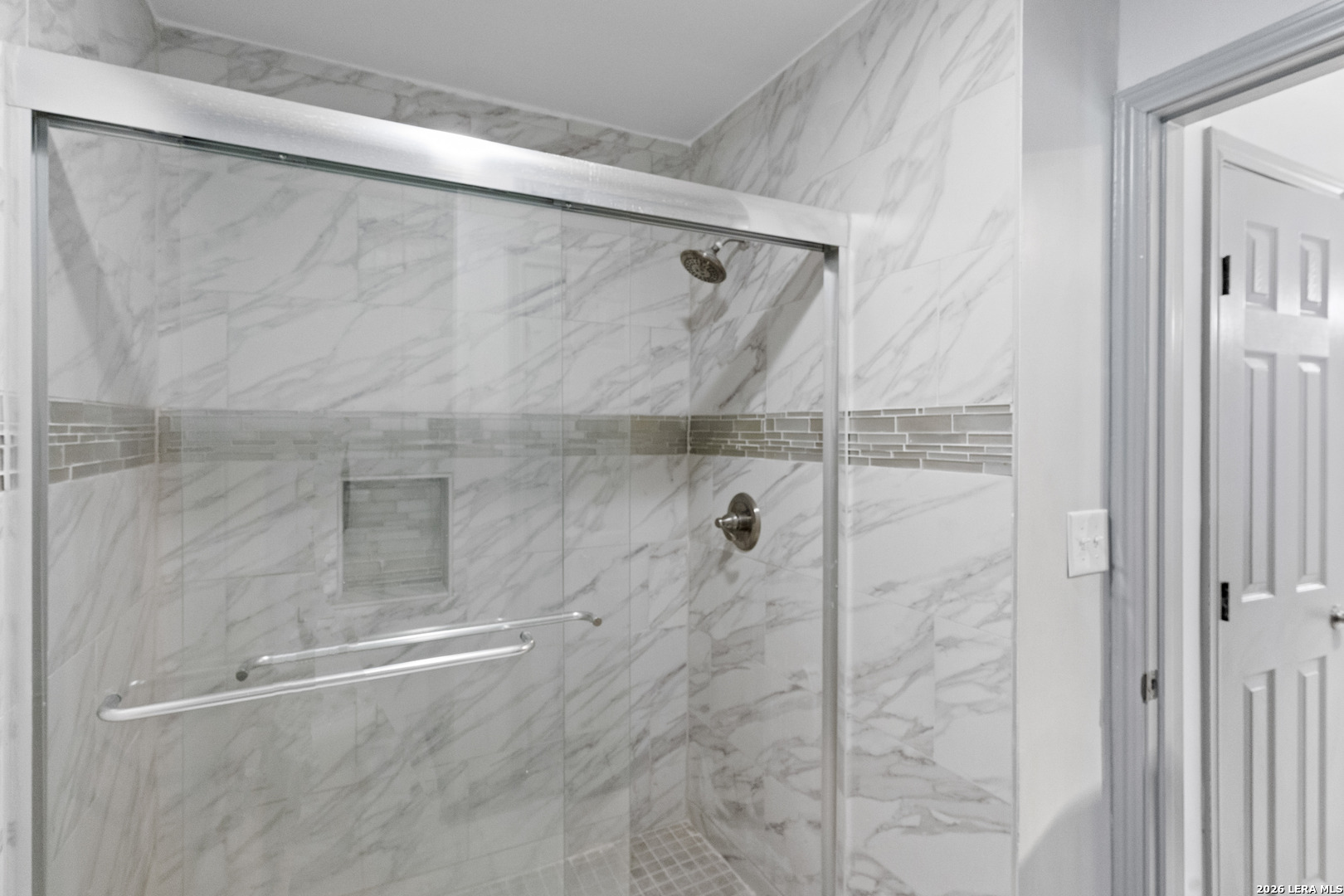 10527 Perrin Beitel Road, Unit C104 San Antonio, TX 78217 - Photo 9 of 11 a bathroom with a shower